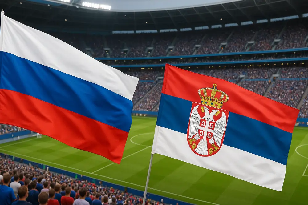Миодраг Божович дает интервью на фоне флага Сербии